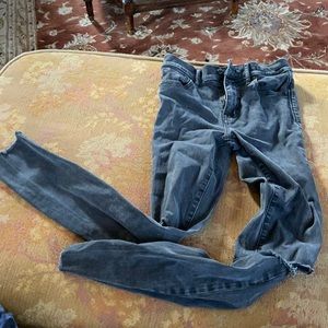 Madewell black 25 jeans with knee rips